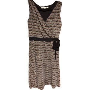 Studio M sleeveless knee length faux wrap dress with sewn on side tie belt.